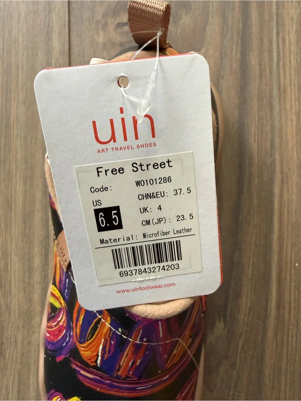 UIN Black Slip-On Shoes with Orange and Purple Swirl